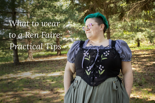 A woman walks through the woods, wearing a small-scale gingham Willow Top and green Lorien Lace-up Skirt, paired with a black lace-up corset top. A title reads "What to wear to a Ren Faire: Practical Tips"